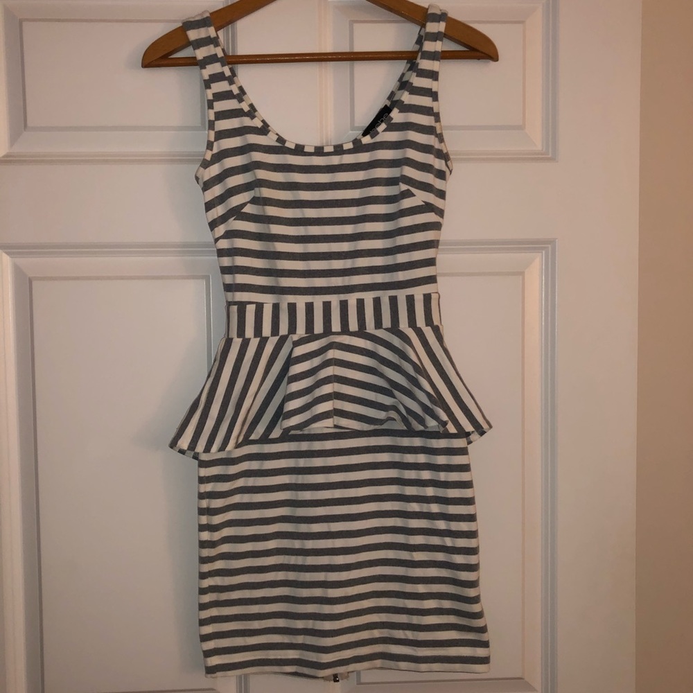 bebe Gray & White stripe mid thigh peplum dress.